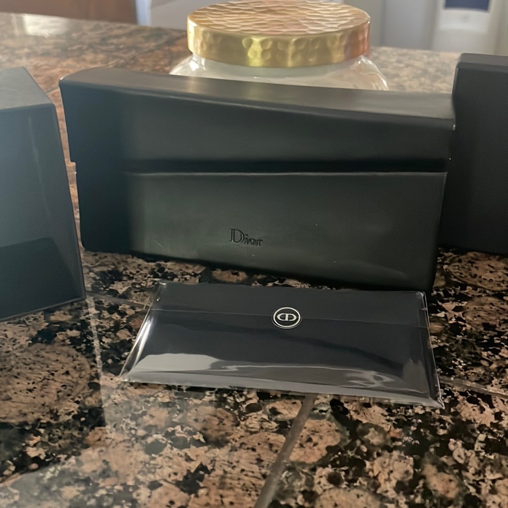 Box and case from Dior  (sunglasses not included)